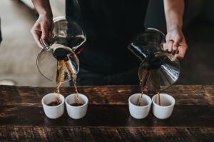 Someone pouring coffee