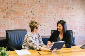 Two women in a successful candidate interview