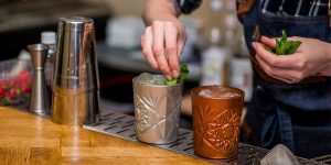 A bartender making drinks