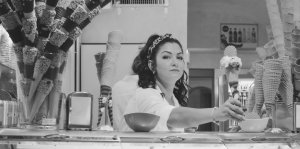 A woman working in an ice cream shop