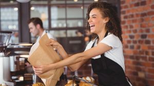A woman working at a restaurant