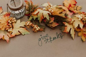 Leaves and text reading "give thanks"