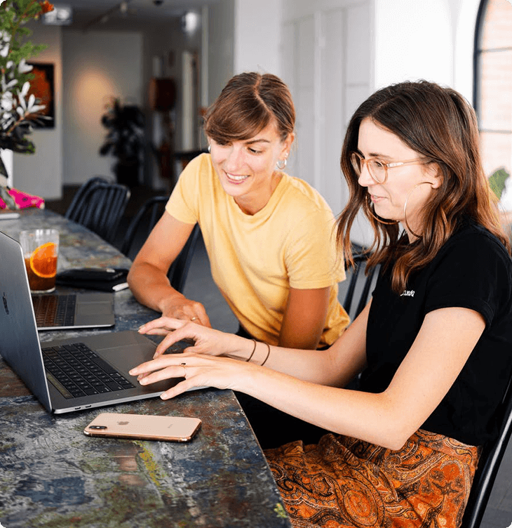Two ladies on a laptop