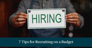 Someone holding a "Hiring" sign with text reading, "7 Tips for Recruiting on a Budget"