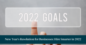 Someone pointing to a sign that reads "2022 GOALS" and text reading "New Year’s Resolution for Businesses: Hire Smarter in 2022"