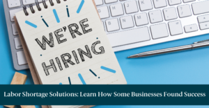 A notepad that reads "We're Hiring" and text reading "Labor Shortage Solutions: Learn How Some Businesses Found Success"