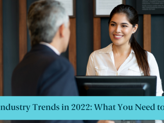 A hotel receptionist and text reading "Hotel Industry Trends in 2022: What You Need to Know"